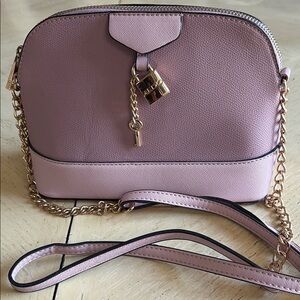 Aldo Pink and Gold Crossbody Bag with Tassel Charm